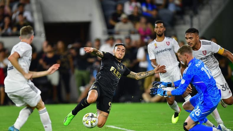 Sep 4, 2022; Los Angeles, California, USA; Los Angeles FC forward Cristian Arango (9) moves in for a shot against Real Salt Lake goalkeeper Zac MacMath (18) and defender Marcelo Silva (30) during the first half at Banc of California Stadium. Mandatory Credit: Gary A. Vasquez-USA TODAY Sports