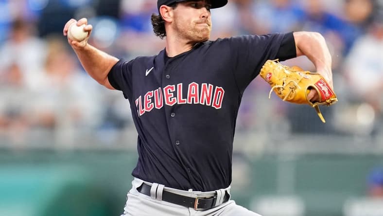 Sep 6, 2022; Kansas City, Missouri, USA; Cleveland Guardians starting pitcher Shane Bieber (57) pitches against the Kansas City Royals during the first inning at Kauffman Stadium. Mandatory Credit: Jay Biggerstaff-USA TODAY Sports
