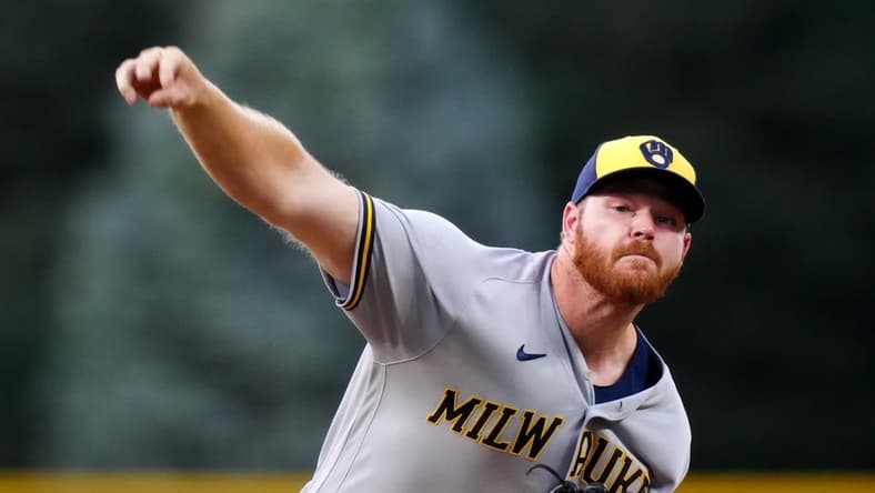 Sep 6, 2022; Denver, Colorado, USA; Milwaukee Brewers starting pitcher Brandon Woodruff (53) pitches in the first inning against the Colorado Rockies at Coors Field. Mandatory Credit: Ron Chenoy-USA TODAY Sports