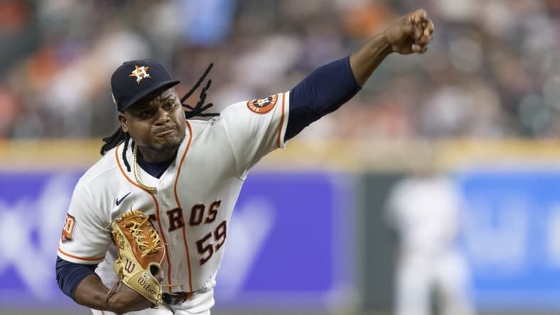 Sep 6, 2022; Houston, Texas, USA; Houston Astros starting pitcher Framber Valdez (59) pitches against the Texas Rangers in the fourth inning at Minute Maid Park. Mandatory Credit: Thomas Shea-USA TODAY Sports