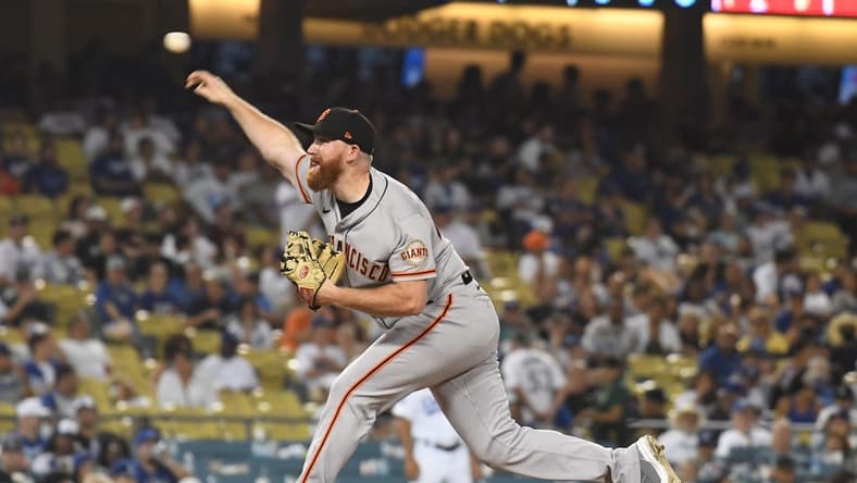 Sep 6, 2022; Los Angeles, California, USA; San Francisco Giants relief pitcher Zack Littell (46) throws a pitch in the eighth inning against the Los Angeles Dodgers at Dodger Stadium. Mandatory Credit: Richard Mackson-USA TODAY Sports