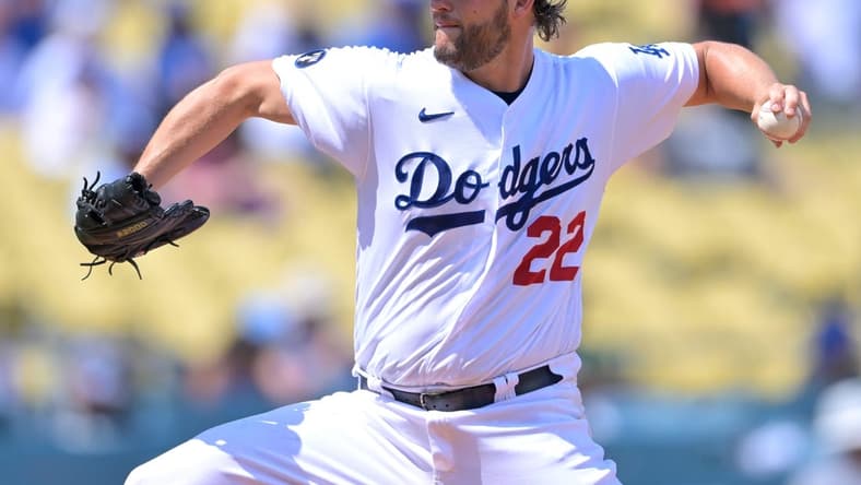 Sep 7, 2022; Los Angeles, California, USA;  Los Angeles Dodgers starting pitcher Clayton Kershaw (22) throws to the plate in the first inning against the San Francisco Giants at Dodger Stadium. Mandatory Credit: Jayne Kamin-Oncea-USA TODAY Sports