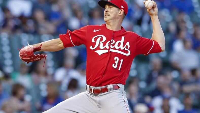 Sep 7, 2022; Chicago, Illinois, USA; Cincinnati Reds starting pitcher Mike Minor (31) delivers against the Chicago Cubs during the first inning at Wrigley Field. Mandatory Credit: Kamil Krzaczynski-USA TODAY Sports