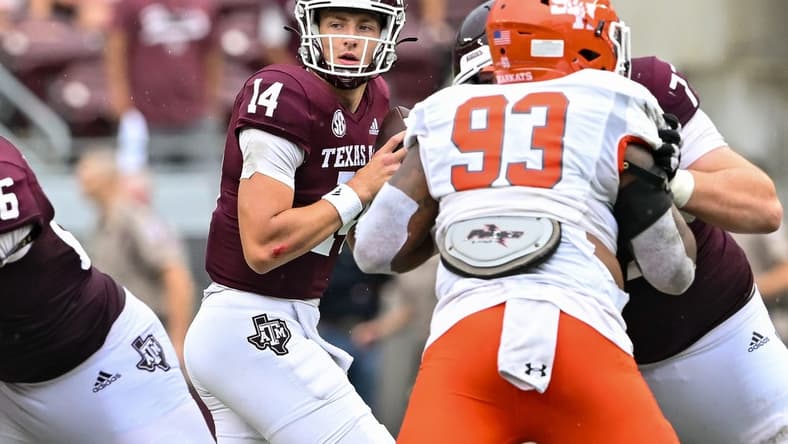 Sep 3, 2022; College Station, Texas, USA; Texas A&M Aggies quarterback Max Johnson (14) throws the ball against the Sam Houston State Bearkats at Kyle Field. Mandatory Credit: Maria Lysaker-USA TODAY Sports