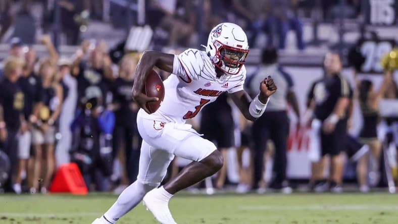 Sep 9, 2022; Orlando, Florida, USA; Louisville Cardinals quarterback Malik Cunningham (3) runs the ball during the first quarter against the UCF Knights at FBC Mortgage Stadium. Mandatory Credit: Mike Watters-USA TODAY Sports