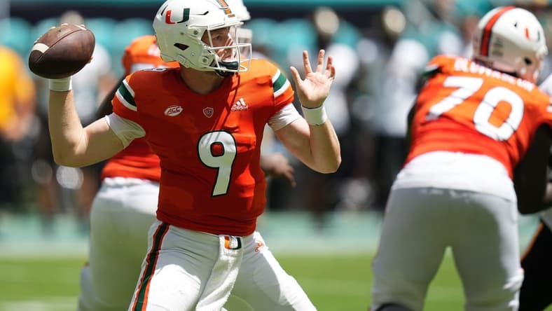 Sep 10, 2022; Miami Gardens, Florida, USA; Miami Hurricanes quarterback Tyler Van Dyke (9) attempts a pass against the Southern Miss Golden Eagles during the first half at Hard Rock Stadium. Mandatory Credit: Jasen Vinlove-USA TODAY Sports