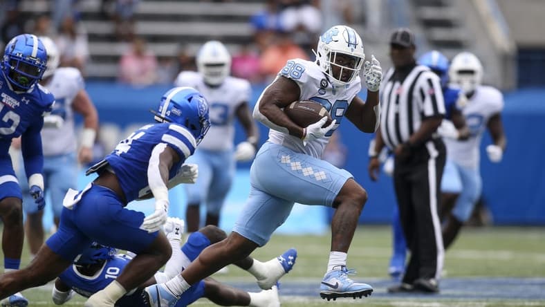 Sep 10, 2022; Atlanta, Georgia, USA; North Carolina Tar Heels tight end Kamari Morales (88) runs for a touchdown after a catch against the Georgia State Panthers in the first half at Center Parc Stadium. Mandatory Credit: Brett Davis-USA TODAY Sports