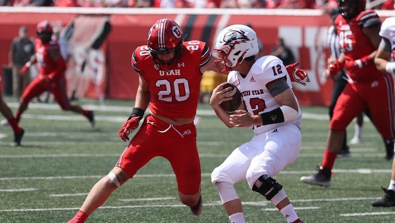 Sep 10, 2022; Salt Lake City, Utah, USA; Utah Utes linebacker Lander Barton (20) prepares to sack Southern Utah Thunderbirds quarterback Justin Miller (12) in the second quarter at Rice-Eccles Stadium. Mandatory Credit: Rob Gray-USA TODAY Sports