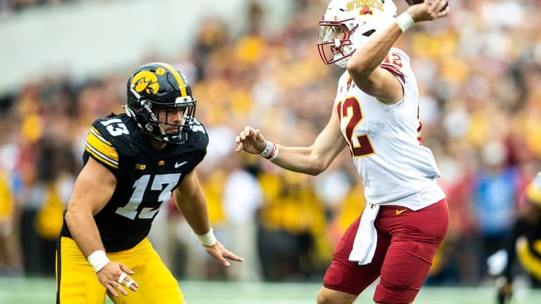 Iowa defensive end Joe Evans (13) pressures Iowa State quarterback Hunter Dekkers (12) during a NCAA football game, Saturday, Sept. 10, 2022, at Kinnick Stadium in Iowa City, Iowa.

220910 Isu Iowa Fb 052 Jpg