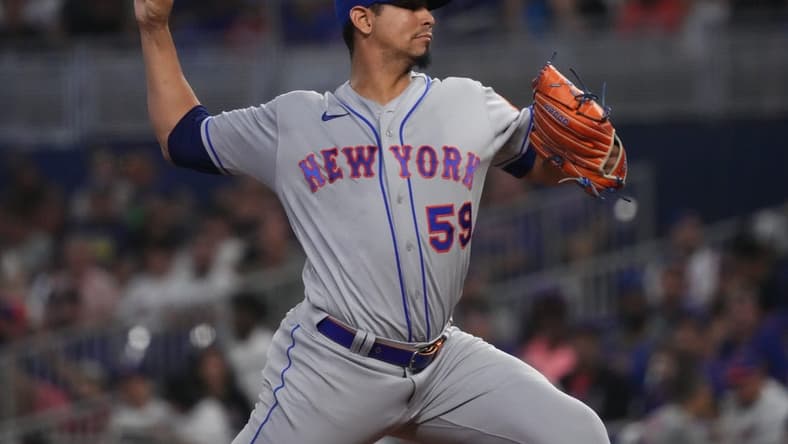 Sep 10, 2022; Miami, Florida, USA; New York Mets starting pitcher Carlos Carrasco (59) delivers a pitch in the first inning against the Miami Marlins at loanDepot park. Mandatory Credit: Jasen Vinlove-USA TODAY Sports