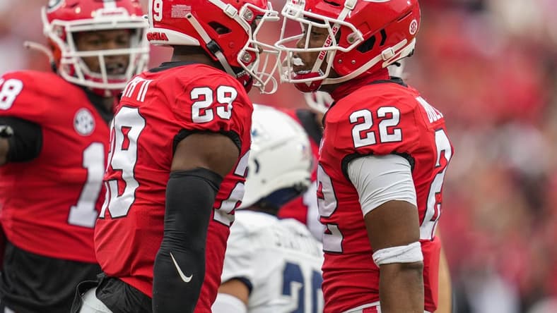 Sep 10, 2022; Athens, Georgia, USA; Georgia Bulldogs defensive back Christopher Smith (29) and defensive back Javon Bullard (22) react after a play against the Samford Bulldogs during the first half at Sanford Stadium. Mandatory Credit: Dale Zanine-USA TODAY Sports
