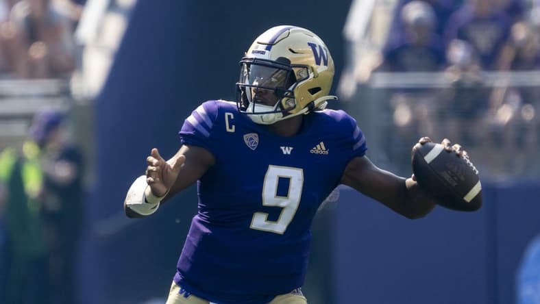 Sep 10, 2022; Seattle, Washington, USA; Washington Huskies quarterback Michael Penix Jr. (9) attempts a pass during the second half against the Portland State Vikings at Alaska Airlines Field at Husky Stadium. Mandatory Credit: Stephen Brashear-USA TODAY Sports