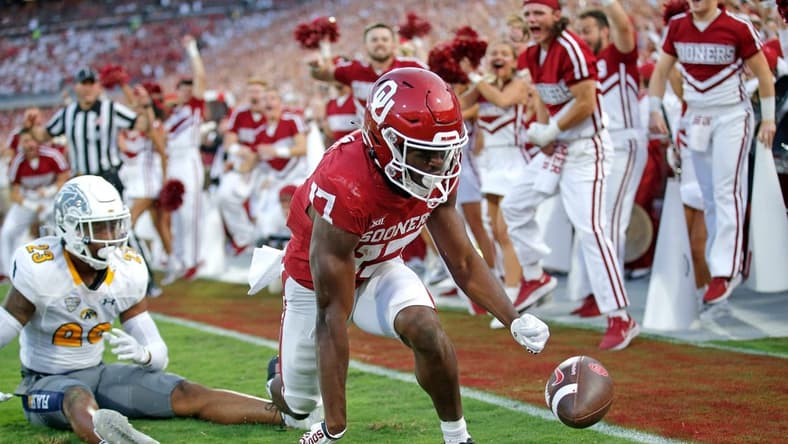 Oklahoma's Marvin Mims (17) celebrates his touchdown pass in front of Kent State's JoJo Evans (23) in the second quarter during the college football game between the University of Oklahoma and the Kent State Golden Flashes at the Gaylord Family Oklahoma Memorial Stadium in Norman, Okla., Saturday, Sept., 10, 2022.
Ou Vs Kent State Fb