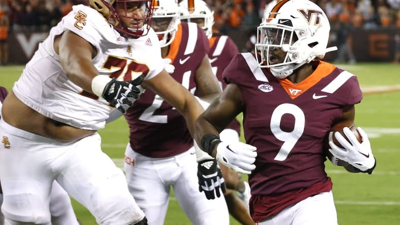 Sep 10, 2022; Blacksburg, Virginia, USA;  Boston College Eagles offensive lineman Kevin Cline (79) closes in on Virginia Tech Hokies defensive back Armani Chatman (9) during the first quarter at Lane Stadium. Mandatory Credit: Reinhold Matay-USA TODAY Sports