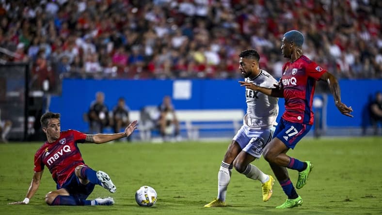 Sep 10, 2022; Frisco, Texas, USA; FC Dallas defender Jose Antonio Martinez (3) defends against Los Angeles FC forward Denis Bouango (99) during the first half at Toyota Stadium. Mandatory Credit: Jerome Miron-USA TODAY Sports