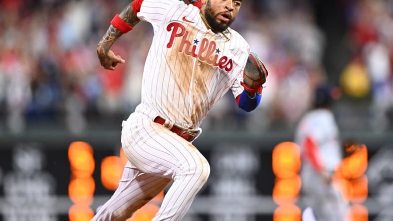 Sep 10, 2022; Philadelphia, Pennsylvania, USA; Philadelphia Phillies infielder Edmundo Sosa (33) rounds third to advance home and score against the Washington Nationals in the fourth inning at Citizens Bank Park. Mandatory Credit: Kyle Ross-USA TODAY Sports