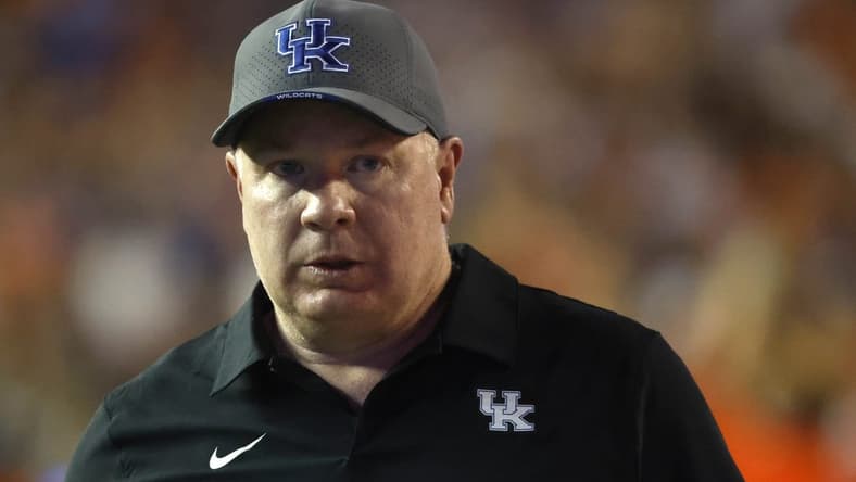 Sep 10, 2022; Gainesville, Florida, USA; Kentucky Wildcats head coach Mark Stoops looks on during the second half against the Florida Gators at Ben Hill Griffin Stadium. Mandatory Credit: Kim Klement-USA TODAY Sports