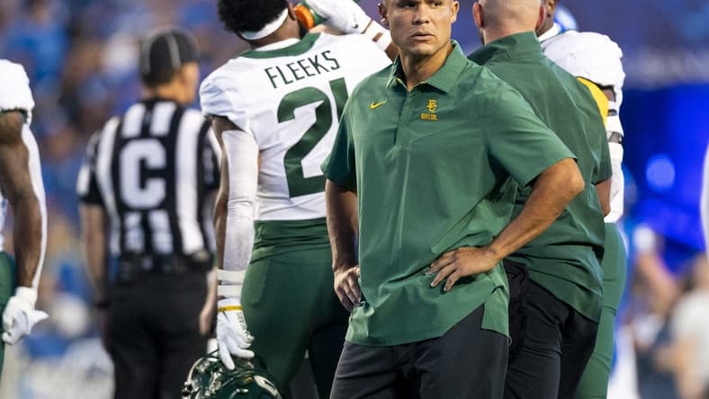 Sep 10, 2022; Provo, Utah, USA; Baylor Bears head coach Dave Aranda supervises warmups as Baylor before a game against the Brigham Young Cougars at LaVell Edwards Stadium. Mandatory Credit: Gabriel Mayberry-USA TODAY Sports
