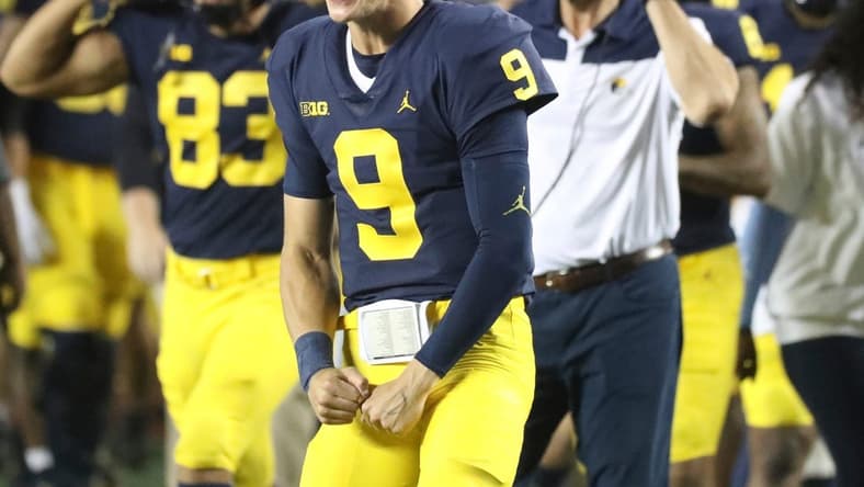 Michigan quarterback J.J. McCarthy celebrates on the sidelines during the second half of the 56-10 win over Hawaii on Saturday, Sept. 10, 2022, in Ann Arbor.

Mich2