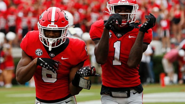 Georgia running back Kenny McIntosh (6) celebrates with Georgia wide receiver Marcus Rosemy-Jacksaint (1) after scoring touchdown during the first half of a college football game between Samford and Georgia in Athens, Ga., on Saturday, Sept. 10, 2022.
Syndication Online Athens