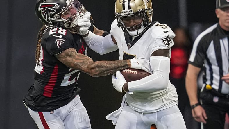 Sep 11, 2022; Atlanta, Georgia, USA; New Orleans Saints wide receiver Jarvis Landry (5) runs against Atlanta Falcons cornerback Mike Ford (28) during the first half at Mercedes-Benz Stadium. Mandatory Credit: Dale Zanine-USA TODAY Sports
