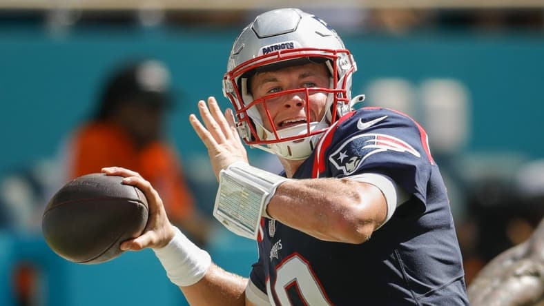 Sep 11, 2022; Miami Gardens, Florida, USA; New England Patriots quarterback Mac Jones (10) throws the football during the fourth quarter against the Miami Dolphins at Hard Rock Stadium. Mandatory Credit: Sam Navarro-USA TODAY Sports