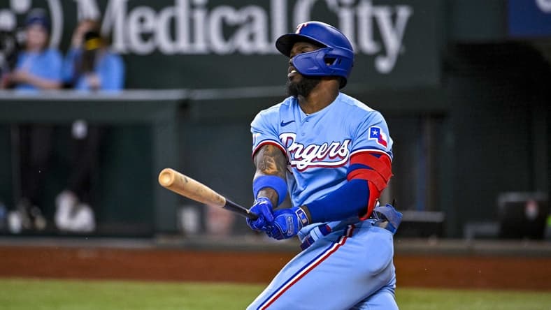 Sep 11, 2022; Arlington, Texas, USA; Texas Rangers right fielder Adolis Garcia (53) bats against the Toronto Blue Jays during the eighth inning at Globe Life Field. Mandatory Credit: Jerome Miron-USA TODAY Sports