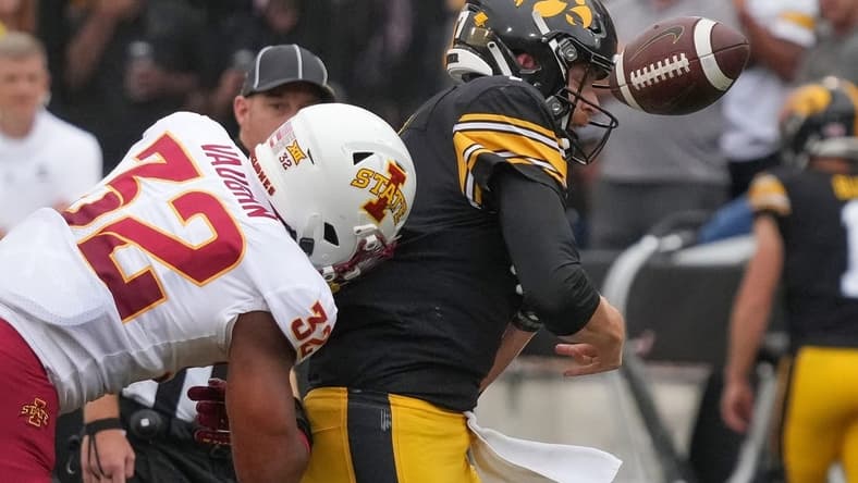 Iowa State linebacker Gerry Vaughn forces Iowa quarterback Spencer Petras to lose the ball during the Cy-Hawk Series football game on Saturday, Sept. 10, 2022, at Kinnick Stadium in Iowa City.

Cyhawkfootball 20220910 Bh