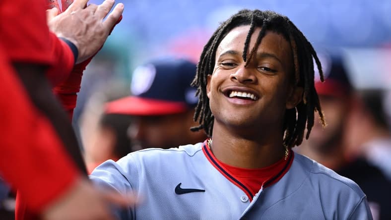 Sep 11, 2022; Philadelphia, Pennsylvania, USA; Washington Nationals infielder CJ Abrams (5) celebrates with teammates after scoring against the Philadelphia Phillies in the fourth inning at Citizens Bank Park. Mandatory Credit: Kyle Ross-USA TODAY Sports