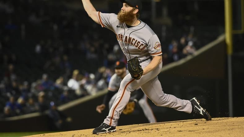 Sep 11, 2022; Chicago, Illinois, USA; San Francisco Giants starting pitcher John Brebbia (59) delivers against the Chicago Cubs during the first inning at Wrigley Field. Mandatory Credit: Matt Marton-USA TODAY Sports