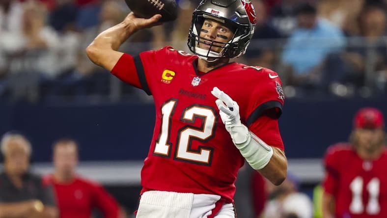 Sep 11, 2022; Arlington, Texas, USA; Tampa Bay Buccaneers quarterback Tom Brady (12) throws during the first quarter against the Dallas Cowboys at AT&T Stadium. Mandatory Credit: Kevin Jairaj-USA TODAY Sports