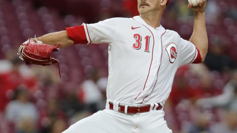 Sep 12, 2022; Cincinnati, Ohio, USA; Cincinnati Reds starting pitcher Mike Minor (31) throws a pitch against the Pittsburgh Pirates during the first inning at Great American Ball Park. Mandatory Credit: David Kohl-USA TODAY Sports