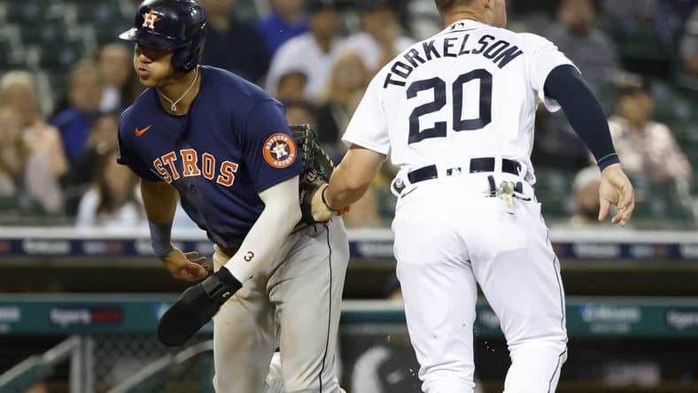 Sep 12, 2022; Detroit, Michigan, USA;  Detroit Tigers first baseman Spencer Torkelson (20) tags Houston Astros shortstop Jeremy Pena (3) out in the fifth inning at Comerica Park. Mandatory Credit: Rick Osentoski-USA TODAY Sports