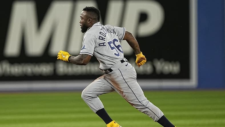 Sep 12, 2022; Toronto, Ontario, CAN; Tampa Bay Rays right fielder Randy Arozarena (56) runs to third base on a throwing error by Toronto Blue Jays catcher Danny Jansen (not pictured) during the sixth inning at Rogers Centre. Mandatory Credit: John E. Sokolowski-USA TODAY Sports
