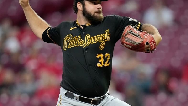 Pittsburgh Pirates starting pitcher Bryse Wilson (32) throws a pitch in the first inning of the MLB National League game between the Cincinnati Reds and the Pittsburgh Pirates at Great American Ball Park in downtown Cincinnati on Monday, Sept. 12, 2022. The Pirates led 6-2 in the top of the sixth inning.
Pittsburgh Pirates At Cincinnati Reds