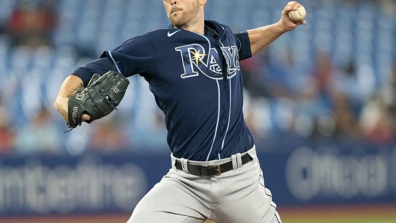 Sep 13, 2022; Toronto, Ontario, CAN; Tampa Bay Rays starting pitcher Jeffrey Springs (59) throws a pitch against the Toronto Blue Jays during the first inning at Rogers Centre. Mandatory Credit: Nick Turchiaro-USA TODAY Sports