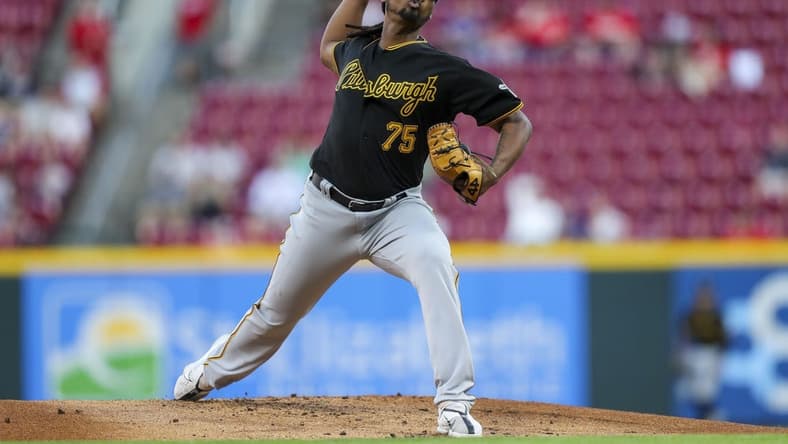 Sep 13, 2022; Cincinnati, Ohio, USA; Pittsburgh Pirates starting pitcher Luis Ortiz (75) pitches against the Cincinnati Reds in the first inning at Great American Ball Park. Mandatory Credit: Katie Stratman-USA TODAY Sports