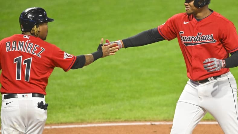 Sep 13, 2022; Cleveland, Ohio, USA; Cleveland Guardians right fielder Oscar Gonzalez (39) celebrates his two-run home run with third baseman Jose Ramirez (11) in the sixth inning against the Los Angeles Angels at Progressive Field. Mandatory Credit: David Richard-USA TODAY Sports