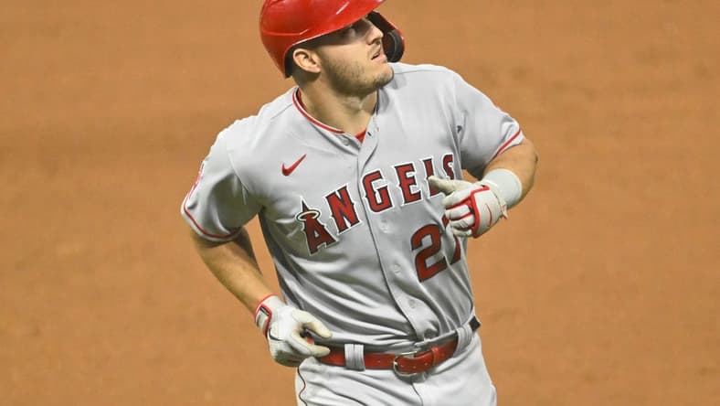 Sep 13, 2022; Cleveland, Ohio, USA; Los Angeles Angels center fielder Mike Trout (27) reacts after flying out in the eighth inning against the Cleveland Guardians at Progressive Field. Mandatory Credit: David Richard-USA TODAY Sports