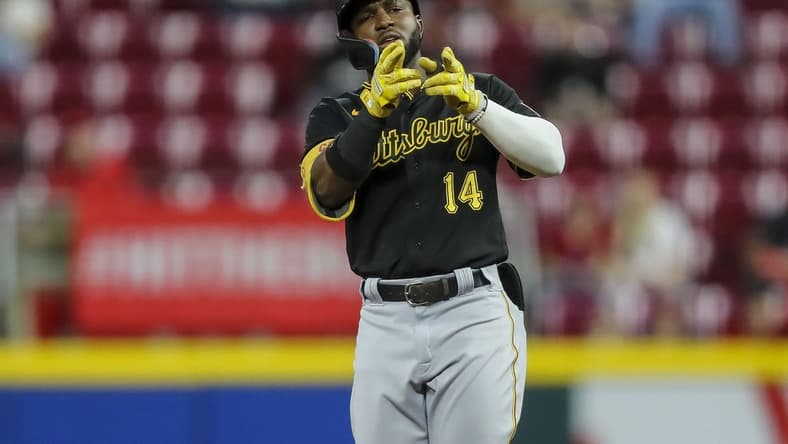 Sep 13, 2022; Cincinnati, Ohio, USA; Pittsburgh Pirates third baseman Rodolfo Castro (14) reacts after hitting a double against the Cincinnati Reds in the seventh inning at Great American Ball Park. Mandatory Credit: Katie Stratman-USA TODAY Sports