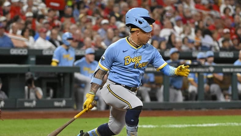 Sep 13, 2022; St. Louis, Missouri, USA;  Milwaukee Brewers second baseman Kolten Wong (16) loses his helmet as he hits in to a fielders choice during the sixth inning at Busch Stadium. Mandatory Credit: Jeff Curry-USA TODAY Sports