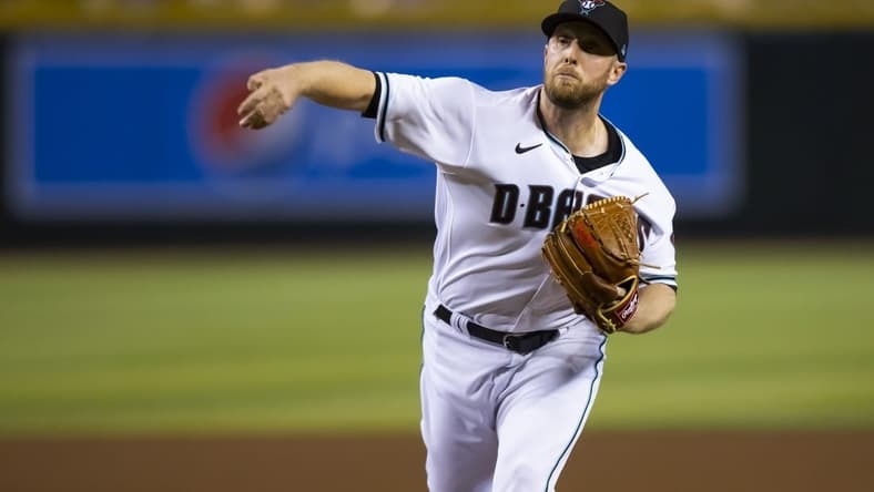 Sep 13, 2022; Phoenix, Arizona, USA; Arizona Diamondbacks pitcher Merrill Kelly in the first inning against the Los Angeles Dodgers at Chase Field. Mandatory Credit: Mark J. Rebilas-USA TODAY Sports