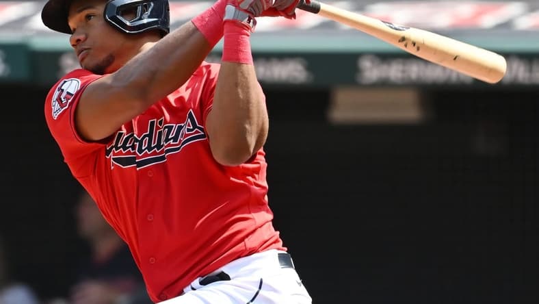 Sep 14, 2022; Cleveland, Ohio, USA; Cleveland Guardians right fielder Oscar Gonzalez (39) hits a home run during the second inning against the Los Angeles Angels at Progressive Field. Mandatory Credit: Ken Blaze-USA TODAY Sports