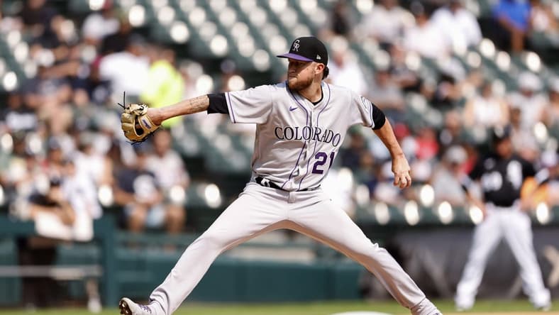 Sep 14, 2022; Chicago, Illinois, USA; Colorado Rockies starting pitcher Kyle Freeland (21) delivers against the Chicago White Sox during the first inning at Guaranteed Rate Field. Mandatory Credit: Kamil Krzaczynski-USA TODAY Sports