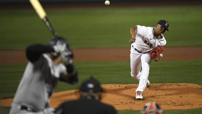 Sep 14, 2022; Boston, Massachusetts, USA; Boston Red Sox starting pitcher Brayan Bello (66) pitches during the first inning against the New York Yankees at Fenway Park. Mandatory Credit: Bob DeChiara-USA TODAY Sports