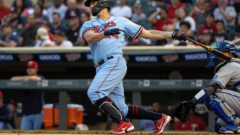 Sep 14, 2022; Minneapolis, Minnesota, USA; Minnesota Twins designated hitter Gary Sanchez (24) hits a two-RBI double during the first inning against the Kansas City Royals at Target Field. Mandatory Credit: Jordan Johnson-USA TODAY Sports