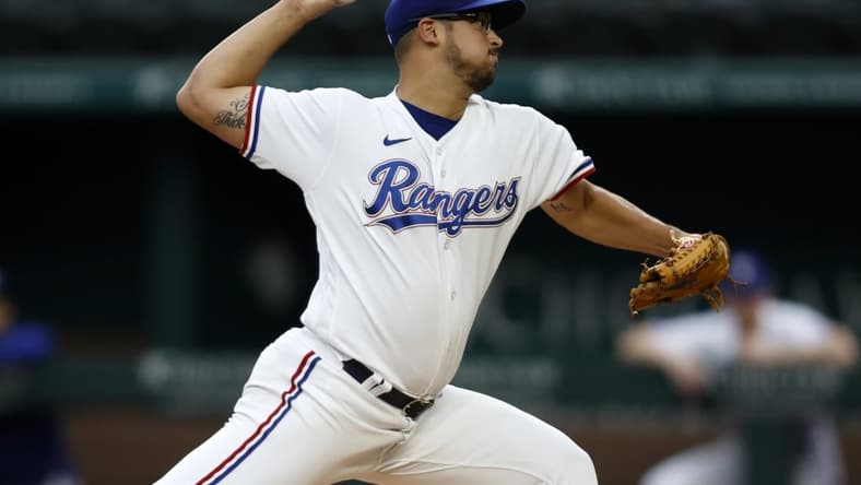 Sep 14, 2022; Arlington, Texas, USA; Texas Rangers starting pitcher Dane Dunning (33) throws a pitch against the Oakland Athletics in the first inning at Globe Life Field. Mandatory Credit: Tim Heitman-USA TODAY Sports