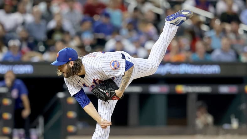 Sep 14, 2022; New York City, New York, USA; New York Mets relief pitcher Trevor Williams (29) follows through on a pitch against the Chicago Cubs during the fifth inning at Citi Field. Mandatory Credit: Brad Penner-USA TODAY Sports
