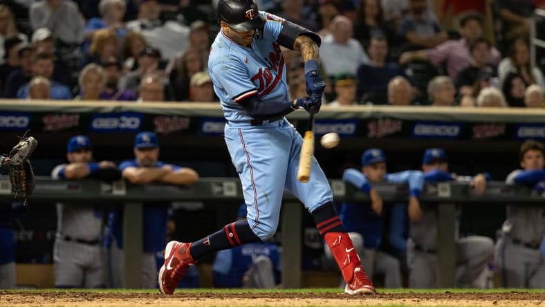 Sep 14, 2022; Minneapolis, Minnesota, USA; Minnesota Twins shortstop Carlos Correa (4) hits a double during the seventh inning against the Kansas City Royals at Target Field. Mandatory Credit: Jordan Johnson-USA TODAY Sports