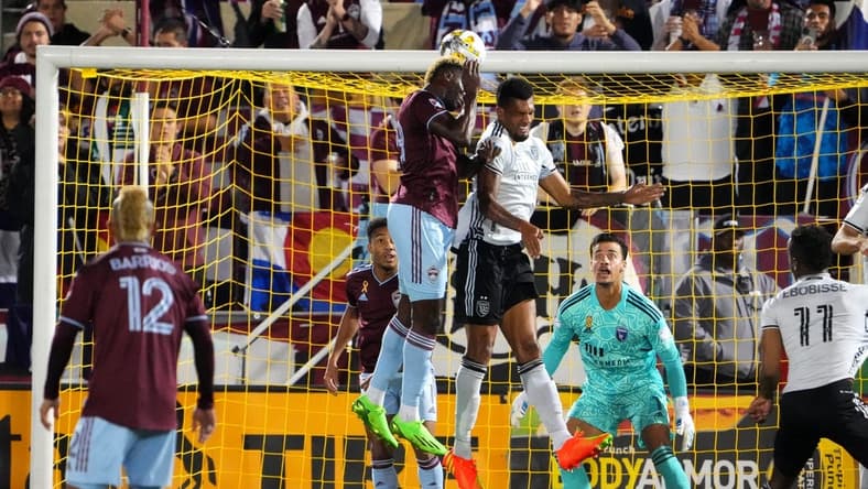 Sep 14, 2022; Commerce City, Colorado, USA; Colorado Rapids forward Gyasi Zardes (29) heads the ball at San Jose Earthquakes midfielder Rodrigues (26) and goalkeeper JT Marcinkowski (1) in the first half at Dick's Sporting Goods Park. Mandatory Credit: Ron Chenoy-USA TODAY Sports